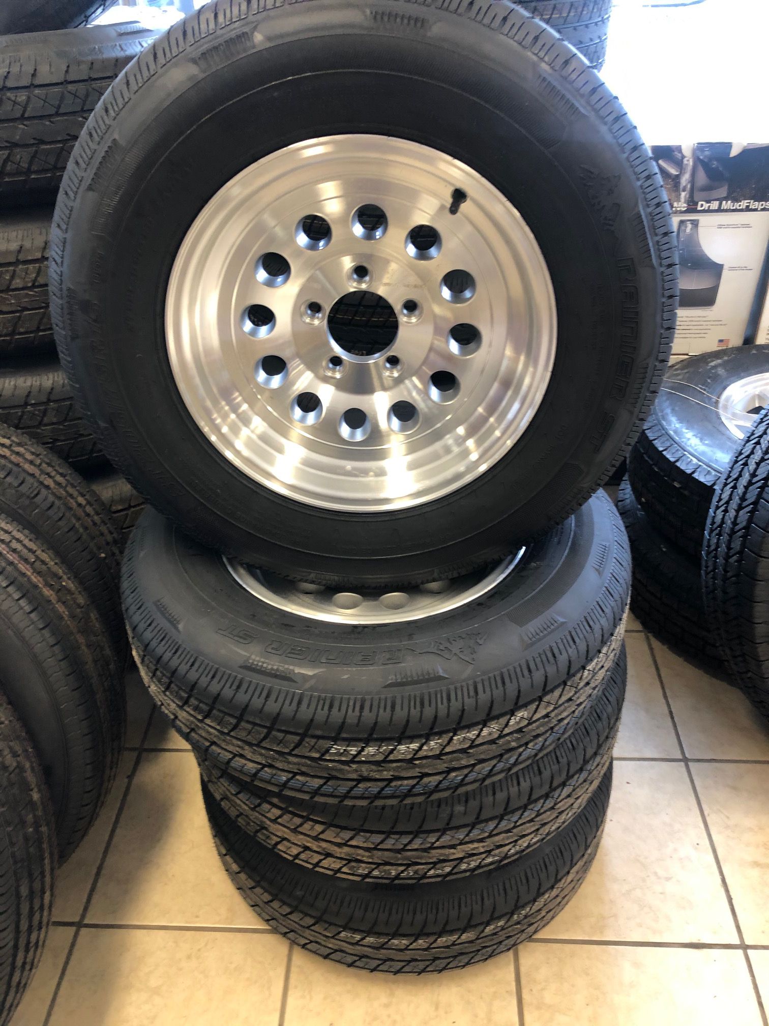 Trailer tires aluminum rims 15" 5 lug - Radial tires - 205/75/15 on 5 lug aluminum rim. Includes center cap and lugs - We will install for free