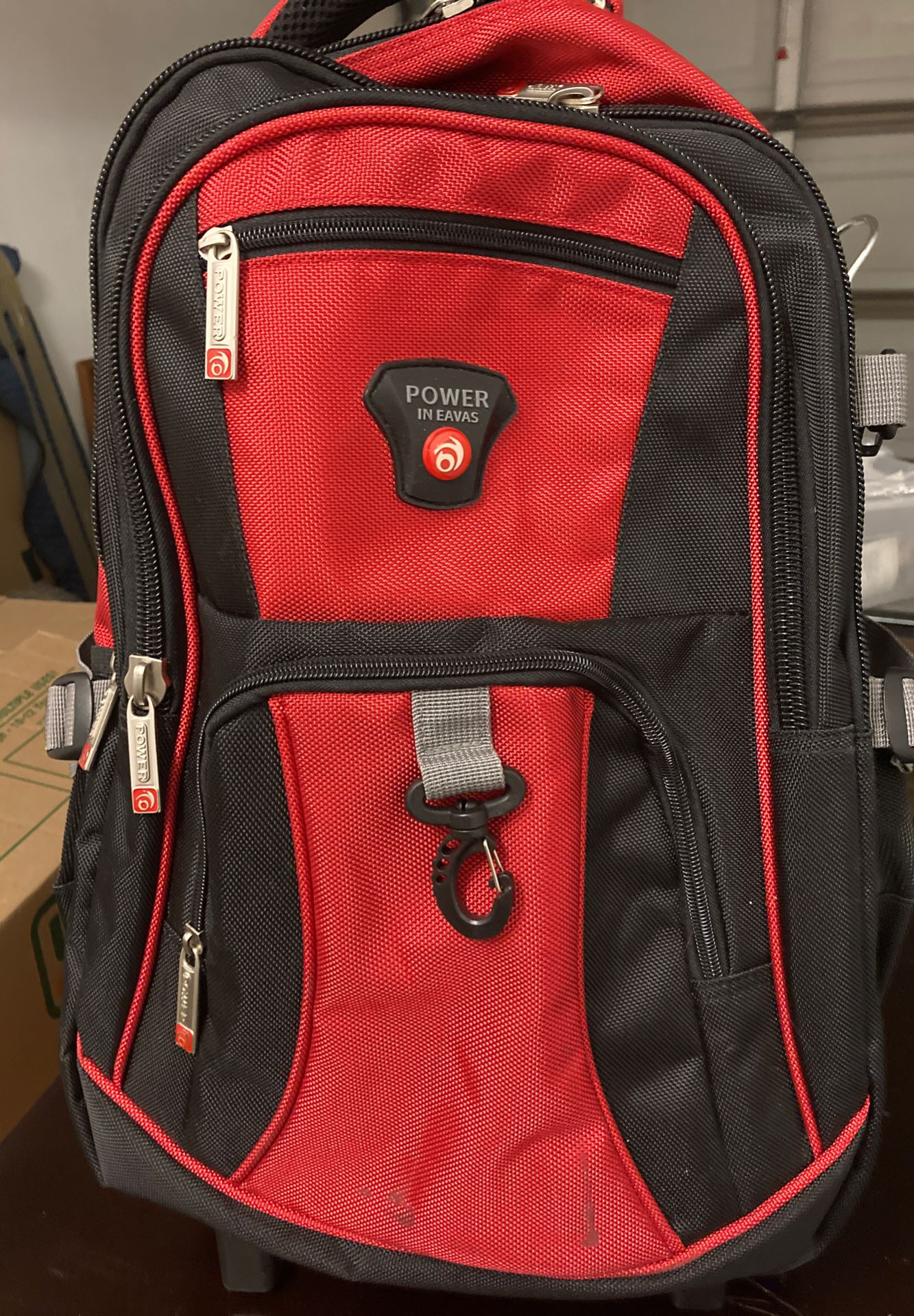 Beautiful red camping backpack with wheels Only used one time