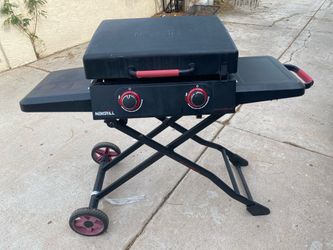 Nexgrill Daytona 2-Burner Propane Gas Griddle with a foldable cart.