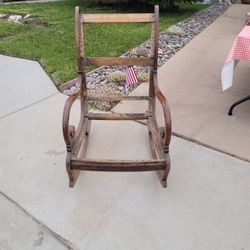 Antique , Un-upholstered Rocking Chair