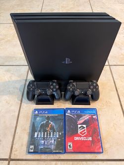 PlayStation 4 + 2 Controllers + 2 Games - Great Condition!