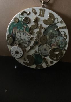 Vintage wall mounted timepiece