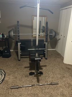 Weight Bench with Full Set of Olympic Weights