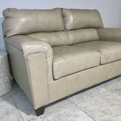 Tan Leather Loveseat