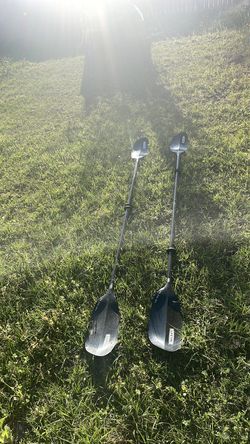 Kayak paddles with cushion seats