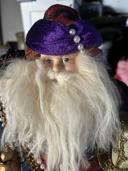 Decorative Santa Claus Figure with Purple Hat