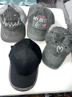 4 women’s ball caps