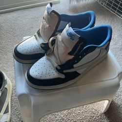 Nike Air Jordan 1 Low Fragment x Travis Scott sneakers. 