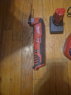 Milwaukee  Multitool Set Batery  And Charger  New