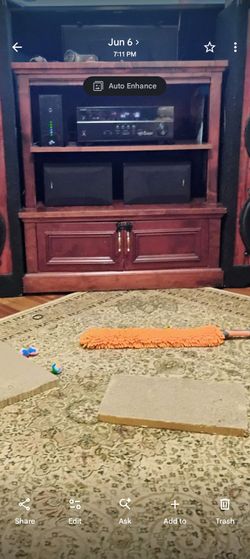 HEAVY DUTY WELL MADE SOLID WOOD TV STAND WITH SHELVING AND TWO DOORS THAT OPEN FOR EXTRA SPACE