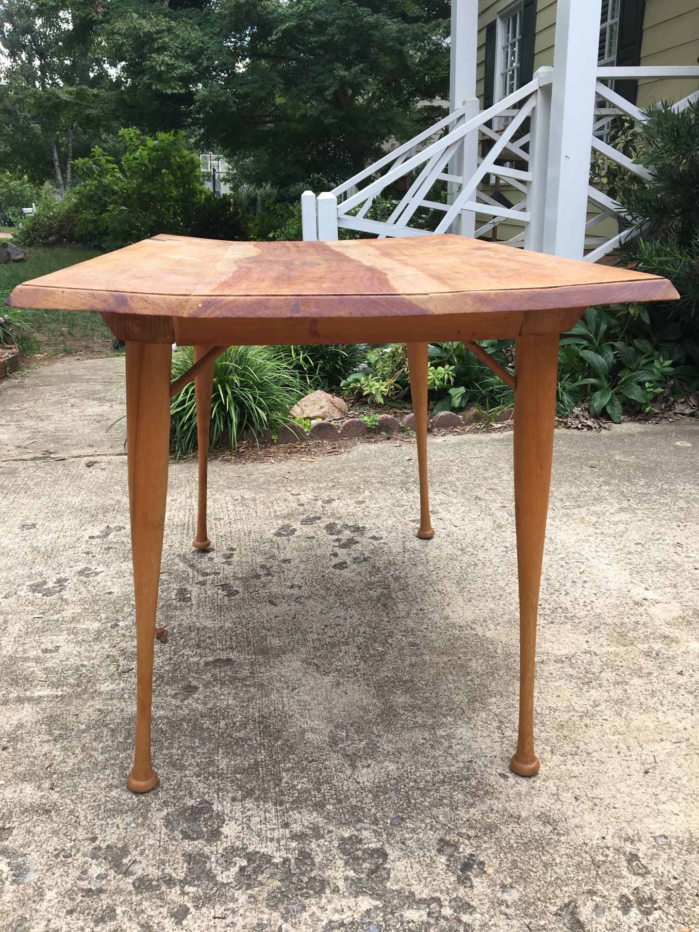 Wood Baseball bat leg table, warped top