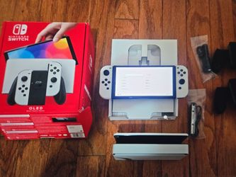 Nintendo switch oled w box. Mint