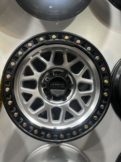 KMC 549 17x9 6x139.7 -12 silver black lip with 265/70R17 all terrain tires available in stock 