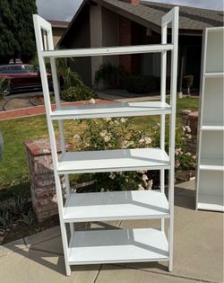 White glass bookshelf