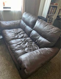 Nice brown leather loveseat