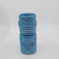 Vintage Marqool Tiki Mug  6" Tiki Bar Aqua Blue Marquesan Art.
Pre-owned, good shape. No chips or cracks,  It is 6 " tall, weight 12oz 
plus shipping 