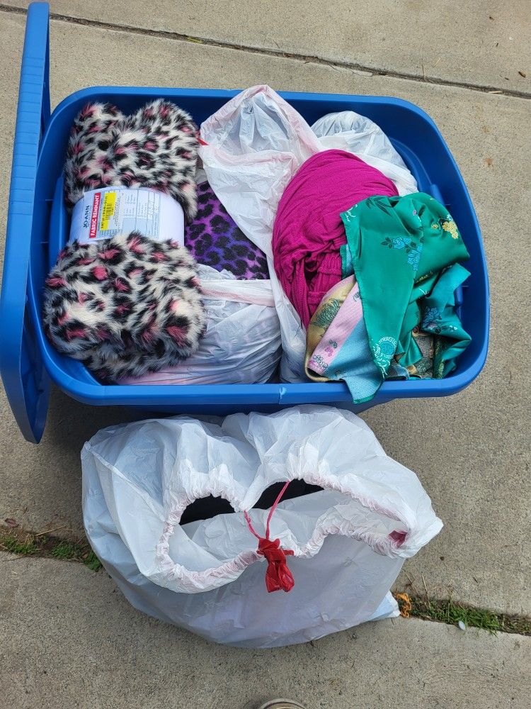 Bin Of Fabrics And Other Cloth Items