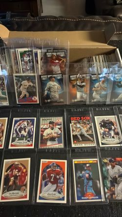 Box full of football and baseball cards