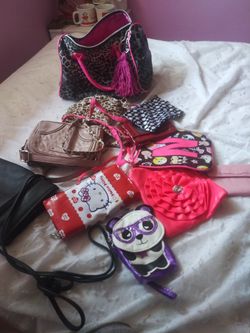 Girls hand bags and wallets.