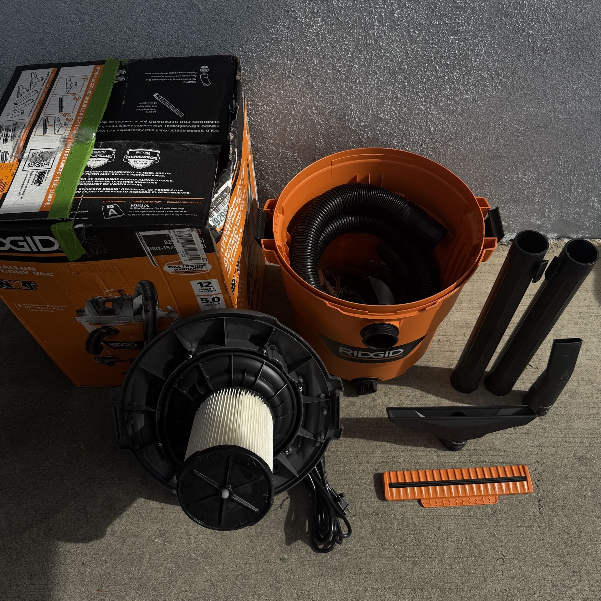 RIDGID 12 Gal. 5.0 Peak HP NXT Shop Vacuum Wet Dry Vac with General Debris Filter, Locking Hose and Attachments HD1200