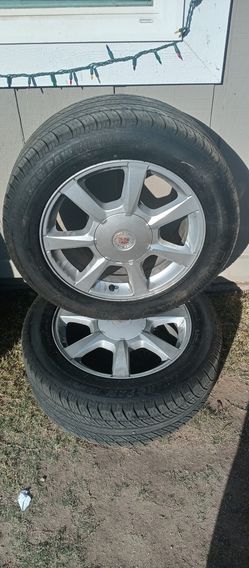 Cadillac cts rim and tires 5 lug. 17s obo