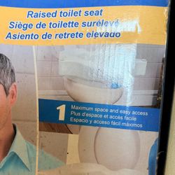 Raised toilet seat