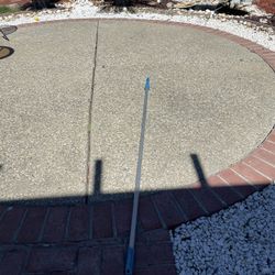 12ft Pole . Extends And Has A Clamp 