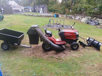 Troy- built rider mower with attachments