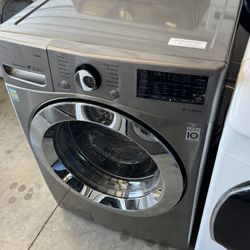 Graphite steel front load lg washer high efficiency working perfectly extra for delivery same day delivery and installation available 