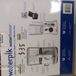 New Waterpolista Water Flosser Original PriceMore Than $100 ( The Box Has 2 Waterpik )