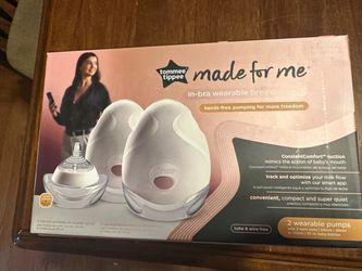 Brand new never opened tommee  tippee double electric wearable breast pump.