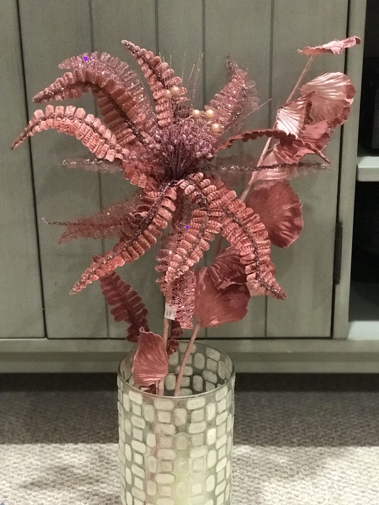 Coral faux flower arrangement