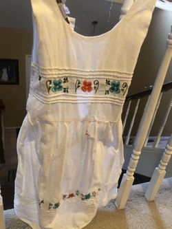 Toddler Dress Size(5-6) color white, with flowers..