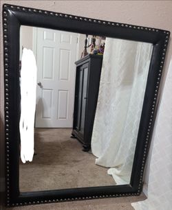 Black framed mirror