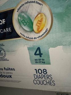 Two boxes of size 4 diapers with extra 3 pieces