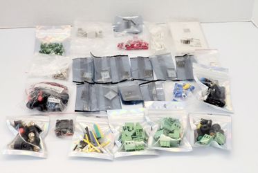 Huge Assorted Lot 2A 5V Charge-Discharge Module/Connector Jacks/ Terminal Blocks. 
This image features a large collection of assorted electronic compo
