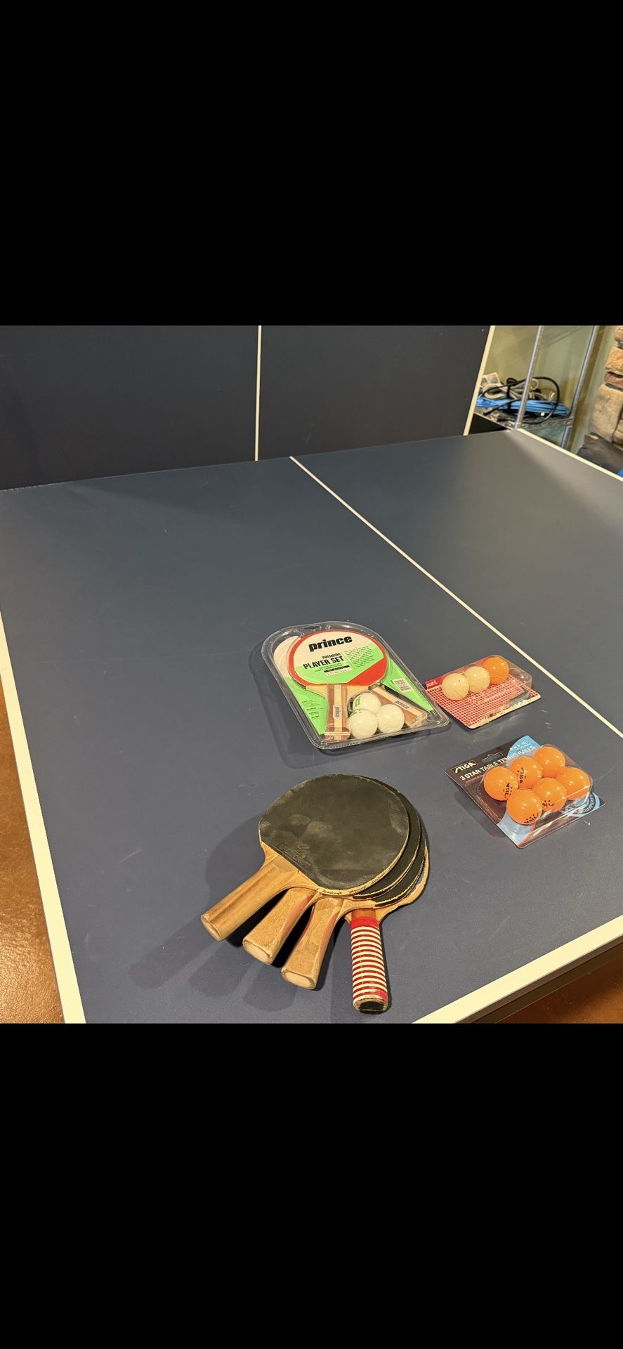 Table Tennis - Foldable and like new with paddles & balls included, just needs net which is about 10.00 dollars