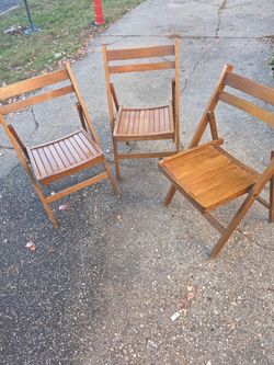 Three solid teak folding chairs the prices firm
