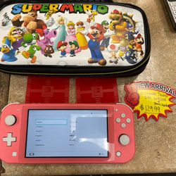 Nintendo Switch Lite W/Extras