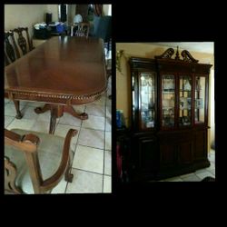 It's a 8 chairs dinning room table colonial all wooden cherry wood. Asking for 1,800:00 good condition