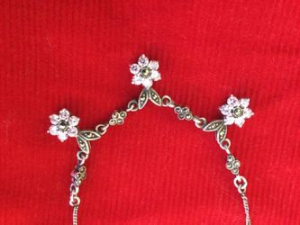 Silver necklace with 3 pink crystal flowers