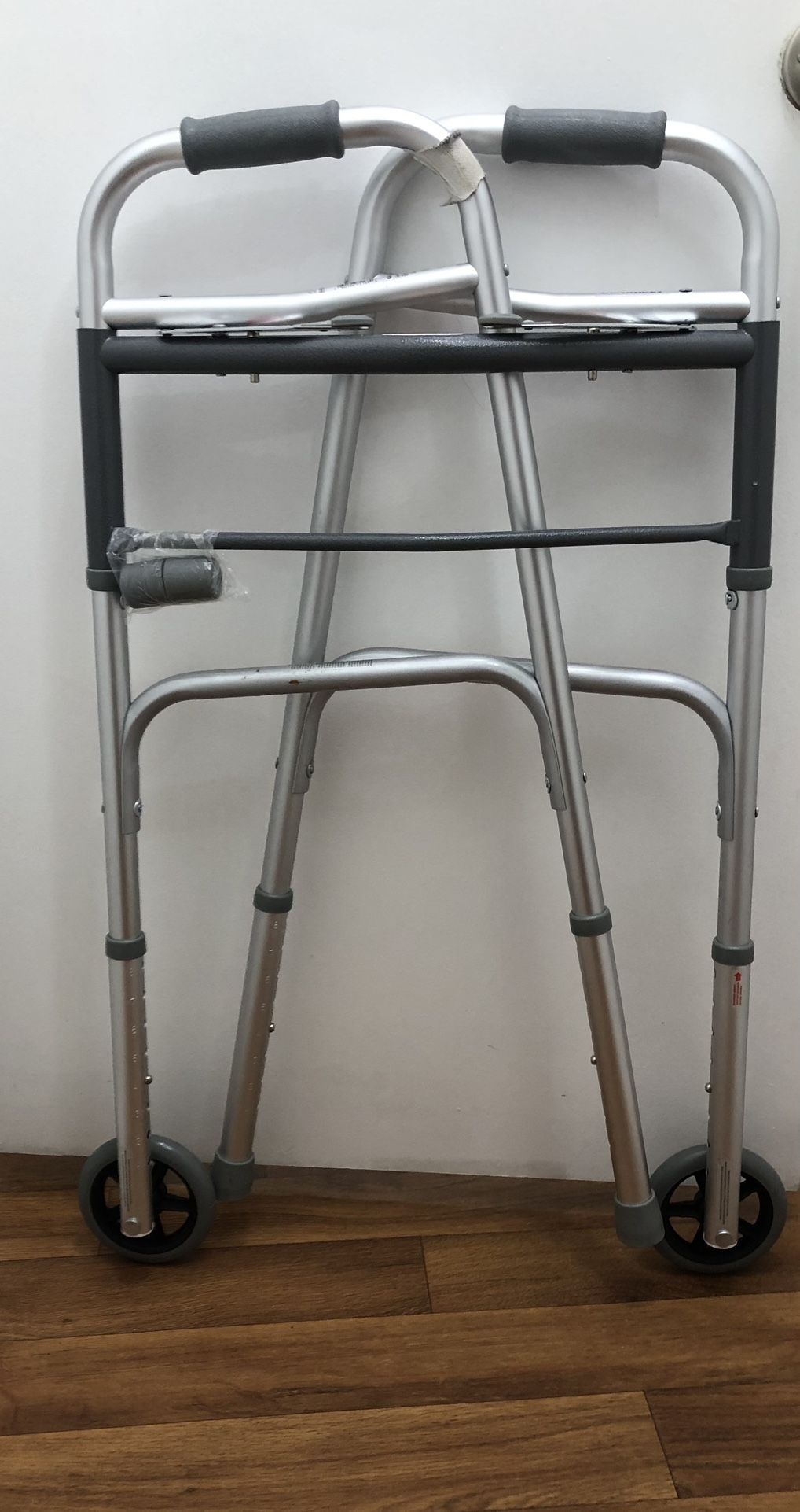 folding Adjustable Silver Walker.