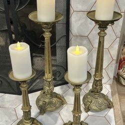 Four Vintage Brass Candle Holders