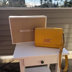 Michael Kors Mimi Medium Leather Messenger Bag in jasmine yellow.  