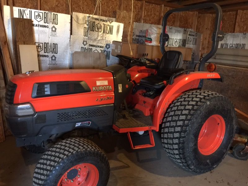 Kubota L3130 with Woods Finish Mower