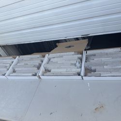 Selling 4 boxes of natural stone ledger panels (Ash Grey – Brentwood pattern).