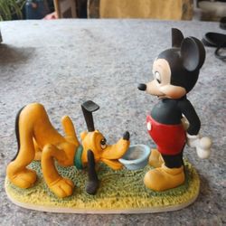 
VINTAGE Walt Disney Mickey Mouse & Pluto Porcelain Bisque Figurine Taiwan

This vintage Walt Disney Mickey Mouse & Pluto Porcelain Bisque Figurine fr
