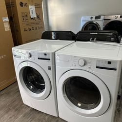 LG newer model washer and dryer set electric with warranty