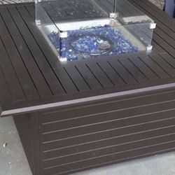 450 Cash Firm 50,000 Btu used as a fire pit and also a dinning set table Near Near AV College also have decorative fire rocks and matching t