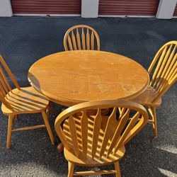 Wooden table and four chairs